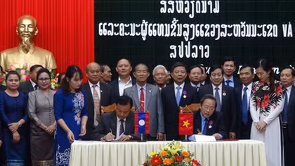 Quang Binh, Lao locality promote cooperation, exchange