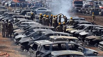 Fire at government-run airshow in India destroys hundreds of cars