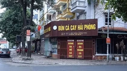 Hanoi orders closure of streetside stalls, religious sites
