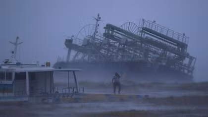 Powerful typhoon bears down on flood-battered Japan