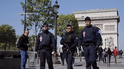 Paris gunman's criminal past in focus as police hunt second suspect