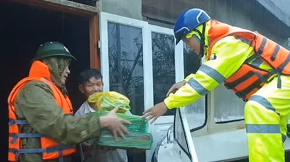Public Security forces help local people in flooding