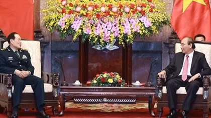 Armies’ successful ties help reinforce Vietnam-China relations: President