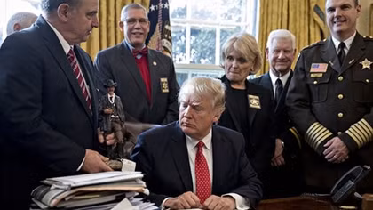 Appeals court presses Trump administration on travel ban