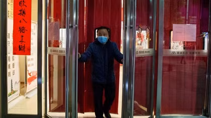 First coronavirus death outside China reported as infections top 14,000