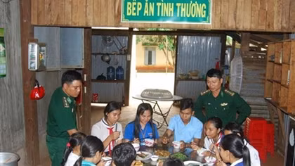 Border guard soldiers help teach students