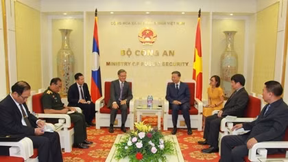 Minister To Lam receives Lao Ambassador to Vietnam 