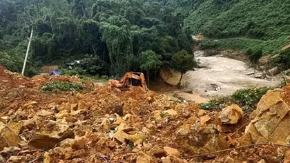 Bodies of 13 rescue team members pulled from landslide rubble