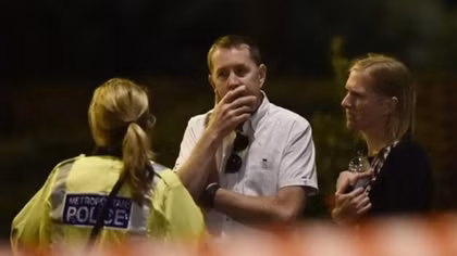 Attackers plow van into London crowd and stab revelers, kill seven
