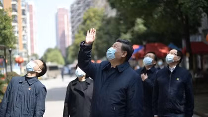 China says coronavirus peak has passed as epicenter logs single-digit new cases