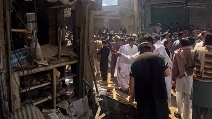 Bomb near mosque in northwest Pakistan kills at least 22, wounds dozens