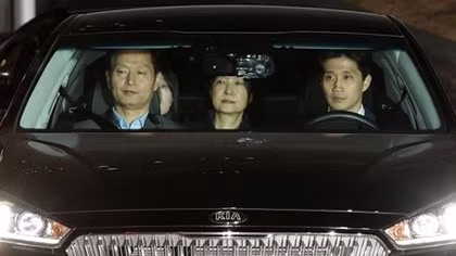 Ousted South Korean leader behind bars after arrest on bribery charges