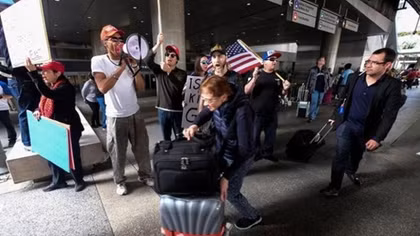 Trump steps up attack on judge, court system over travel ban