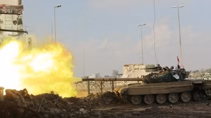 Iraqi troops seize main bridge, advance on mosque in battle for Mosul