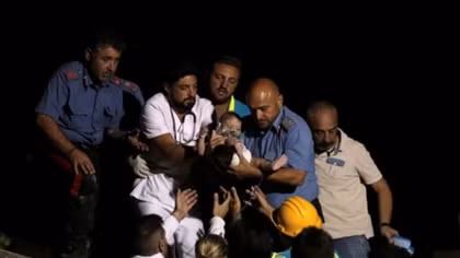Quake kills two on Italian holiday island, young brothers saved
