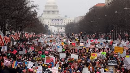 In challenge to Trump, women protesters swarm streets across U.S.