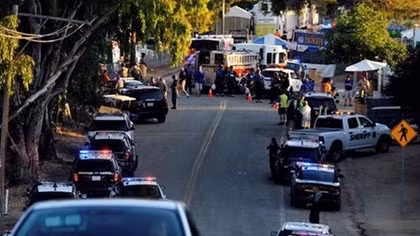 Motive a mystery as California police hunt for accomplice in festival shooting