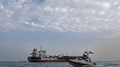 Britain tells Iran: release ship to 'come out of the dark'