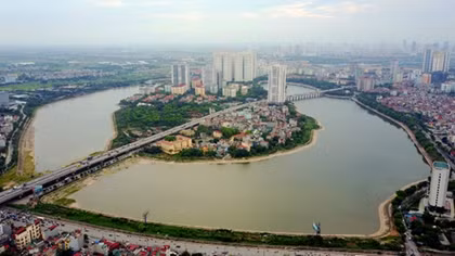 Rising from a Hanoi isle, a city within a city