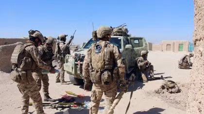Car bomb kills at least 10 police in besieged Afghan city