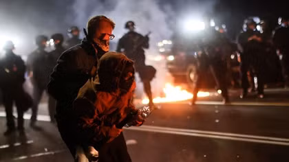 Portland protesters throw fire bombs at officers on 100th day of demonstrations