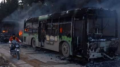 Gunmen burn buses, Aleppo convoy goes through