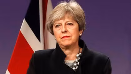 Challenged on all fronts, May faces pressure over Brexit law
