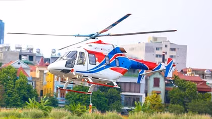 Russian Ansat and Mi-171A2 helicopters take off in Hanoi