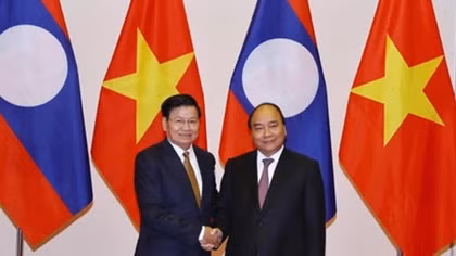 Vietnam, Laos resolved to create breakthrough in trade