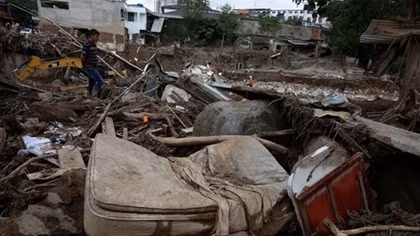Rescuers, locals dig for Colombia flood victims, 254 die