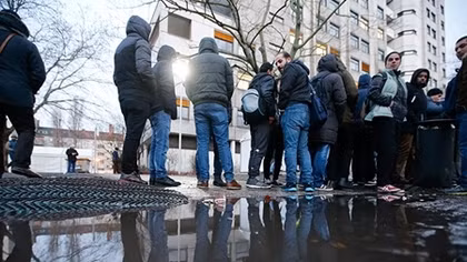 Germany to review up to 100,000 asylum applications after soldier poses as refugee – minister