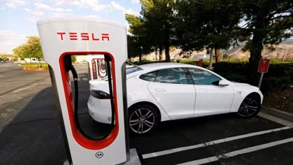 Tesla to raise about $1.15 billion in stock, notes; Musk to buy shares