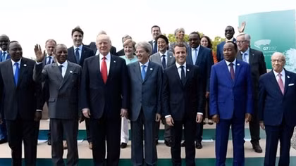 G7 leaders end summit split on climate change, more united on trade