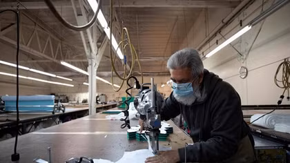 Much of U.S. economy still plugging along despite coronavirus pain