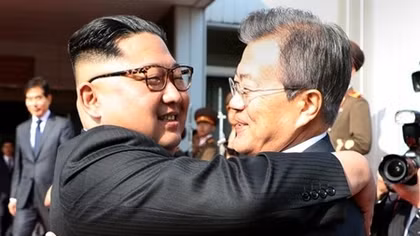 Leaders of two Koreas hold surprise meeting as Trump revives hopes of summit with North