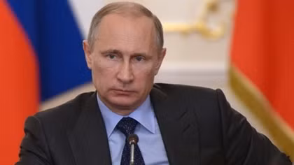 Russia's Putin says Syrian government, opposition sign ceasefire deal
