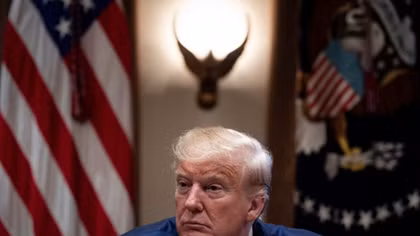 Trump accuses impeachment witness of lying, defends use of Giuliani