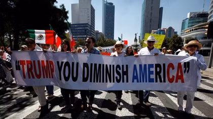 Marchers across Mexico vent anger over Trump, and their own president