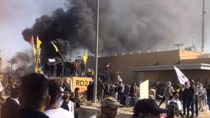 U.S. Embassy evacuated as violent Baghdad protesters denounce air strikes