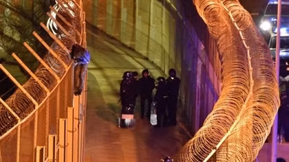 Hundreds of migrants try to storm border into Spain's enclave of Ceuta