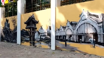 Phan Dinh Phung street brightens up with frescoes of old Hanoi