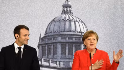 Merkel, Macron meet to plot euro zone reform road map