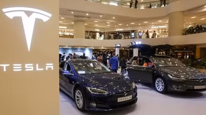 Tesla performs U-turn over store closures