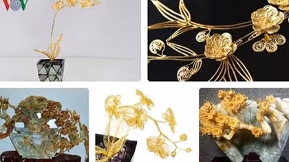 Gold-plated orchid, apricot, and peach tree models attract customers for Tet