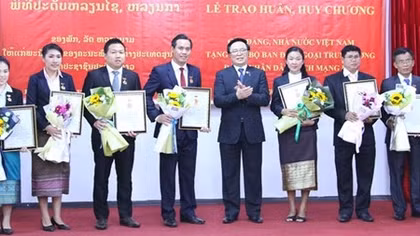 Lao officials honoured for contributions to bilateral ties
