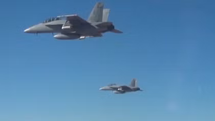 US military tests swarm of mini-drones launched from jets
