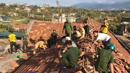 Policemen help people overcome consequences of typhoon Doksuri
