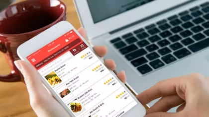 A green-red rivalry heats up food delivery market
