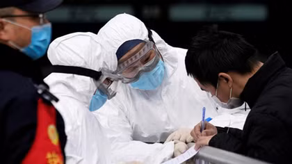 China accuses U.S. of whipping up panic over virus as stocks tumble
