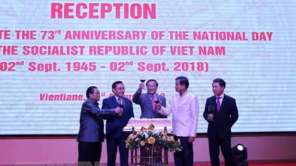 National Day marked in Laos, Mozambique
